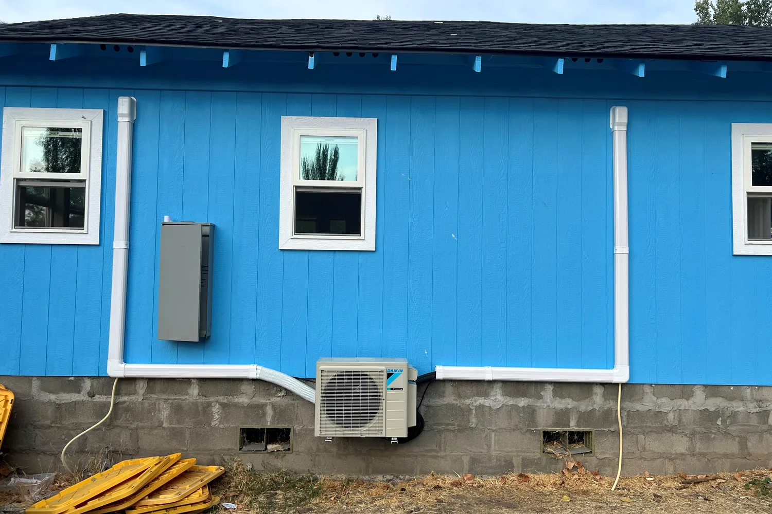 Ductless mini-split outdoor unit and refrigerant lines