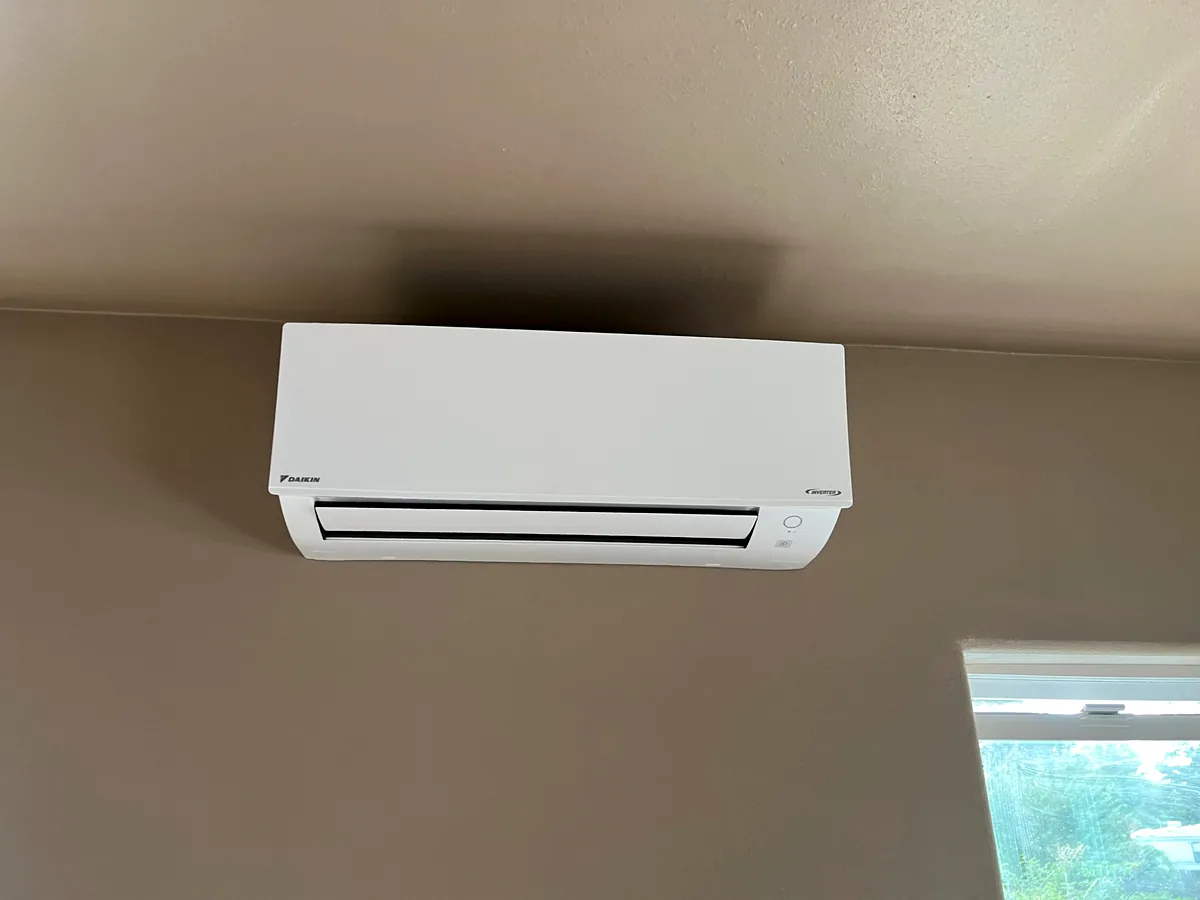 Wall-mounted indoor ductless mini-split head