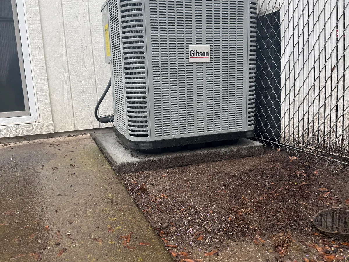 Outdoor Heat-Pump Unit Outdoor heat-pump unit installed beside a building